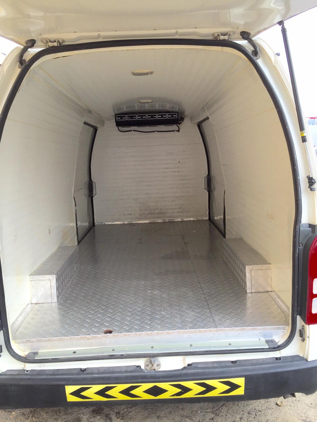 Freezer van interior showing insulated body for frozen transport in Dubai